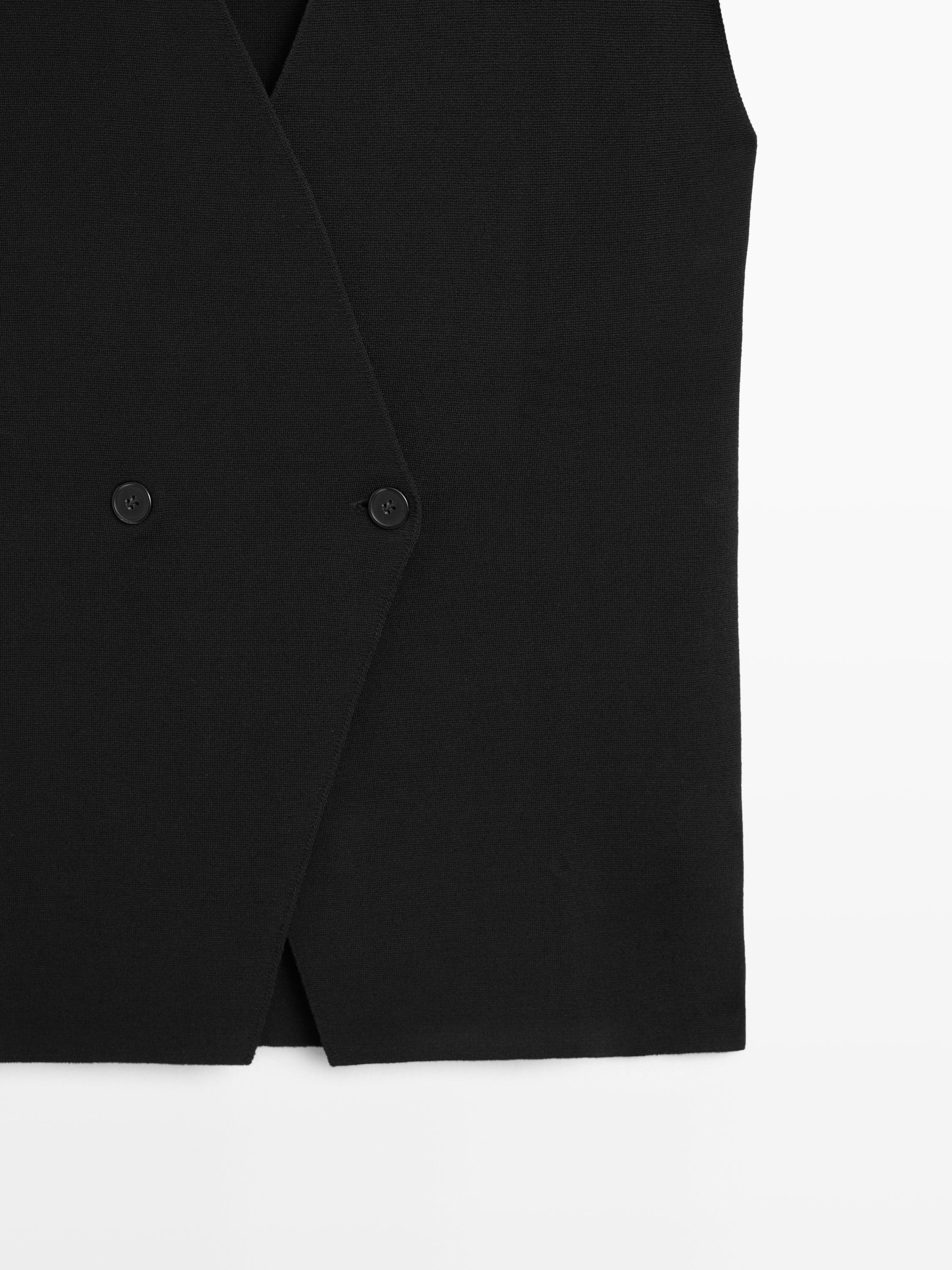 Long double-breasted vest